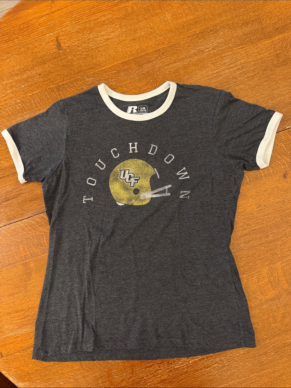 UCF Russell Athletic Black Ringer Tee with White Trim and Gold Football Helmet